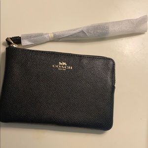 Coach wristlet . Lowest 😊💗